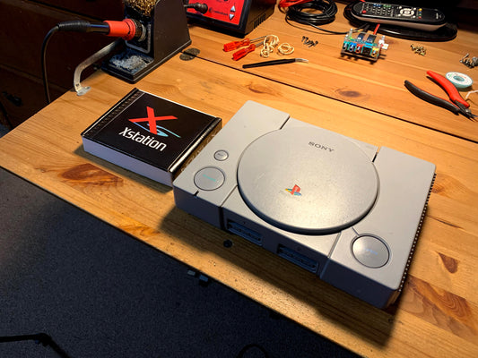 PlayStation console with XStation Optical Disc Emulator