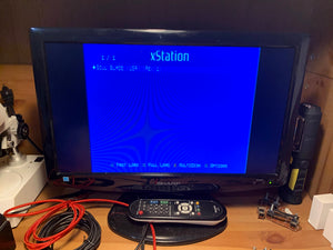 PlayStation console with XStation Optical Disc Emulator